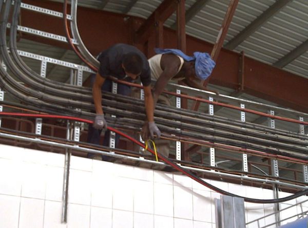 installing_electrical_cables_in_a_factory.jpg